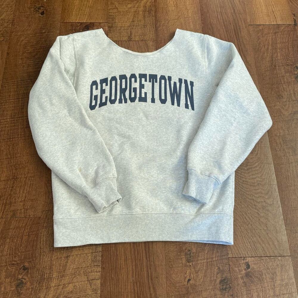 Grey crewneck sweatshirt with